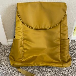Yellow backpack with laptop compartment